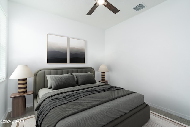 carpeted bedroom featuring ceiling fan