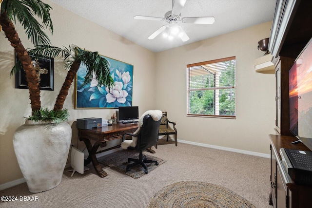 office space featuring carpet floors and ceiling fan