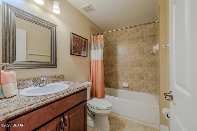 full bathroom featuring toilet, a textured ceiling, shower / bath combination with curtain, and vanity