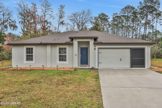 view of front facade with driveway, an attached garage, a front yard, and a shingled roof