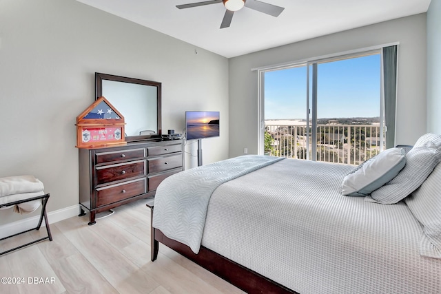 bedroom with ceiling fan and light hardwood / wood-style flooring