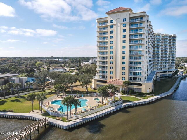 2801 S Ridgewood Ave Unit 608, South Daytona, FL 32119 - aerial view of a pool, a nearby body of water, and apartment complex / building
