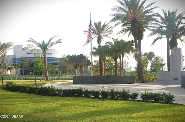 surrounding community featuring a lawn