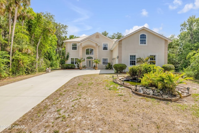 2710 Quiet Ln, Cocoa, FL 32926 - view of front of property featuring driveway and stucco siding