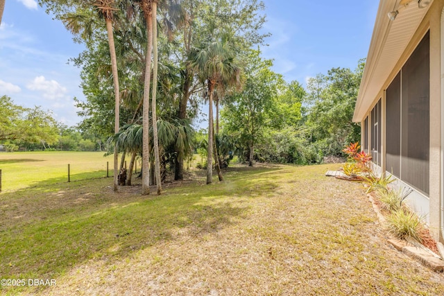 2710 Quiet Ln, Cocoa, FL 32926 - view of yard with a sunroom