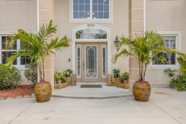 2710 Quiet Ln, Cocoa, FL 32926 - entrance to property featuring stucco siding