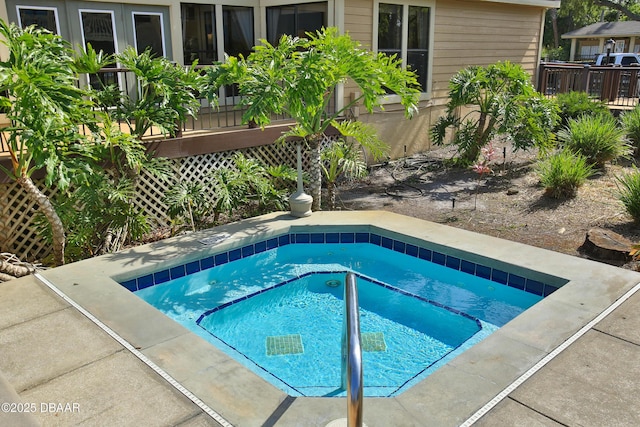1401 S Palmetto Ave Unit 402, Daytona Beach, FL 32114 - view of pool featuring a community hot tub and a pool