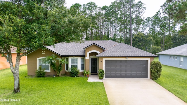 single story home featuring a front lawn and a garage