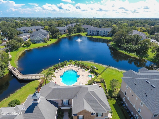 birds eye view of property featuring a water view