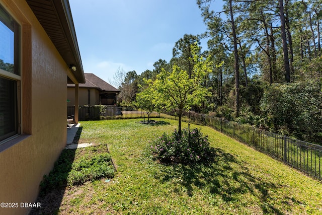 view of yard featuring a fenced backyard