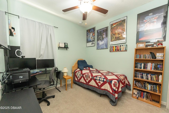 carpeted bedroom featuring a ceiling fan