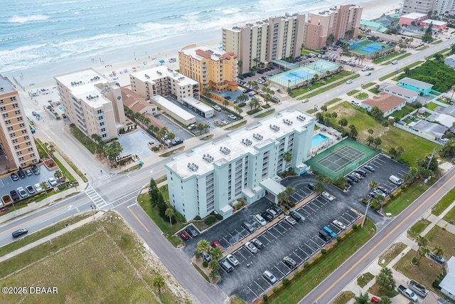 aerial view featuring a beach view and a water view