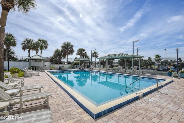 view of swimming pool with a gazebo and a patio area