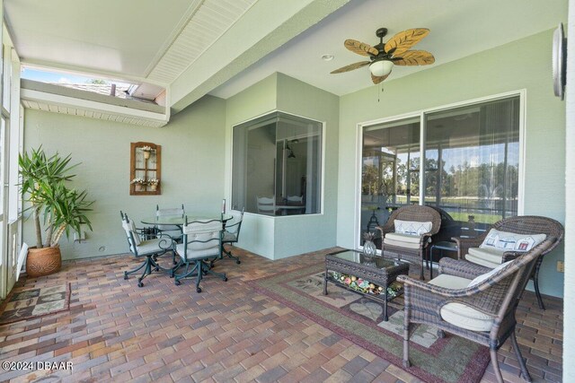 view of patio / terrace featuring ceiling fan