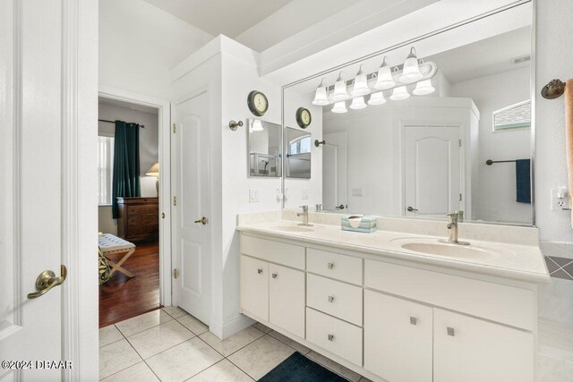 bathroom with wood-type flooring and vanity