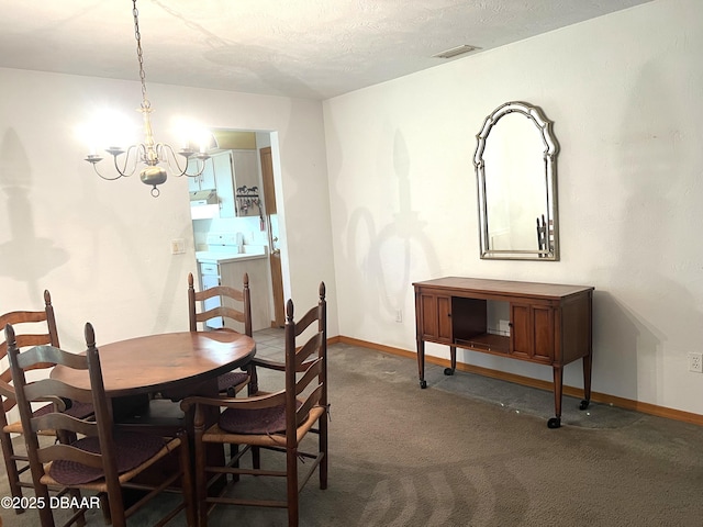 112 Underbrush Trl, Port Orange, FL 32128 - carpeted dining space featuring a chandelier and washer / clothes dryer
