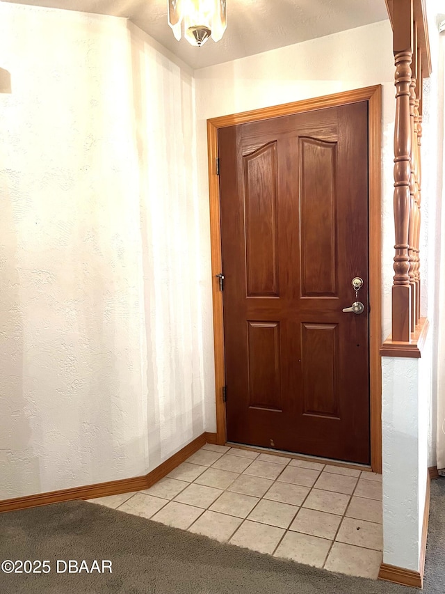 112 Underbrush Trl, Port Orange, FL 32128 - entryway with baseboards and light tile patterned floors