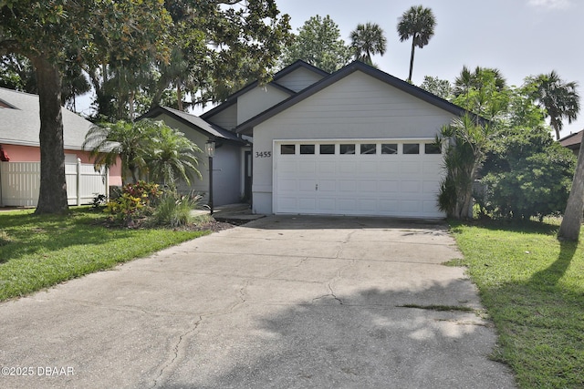 3455 Saddleback Ct, Port Orange, FL 32129 - single story home with a garage, driveway, and a front yard