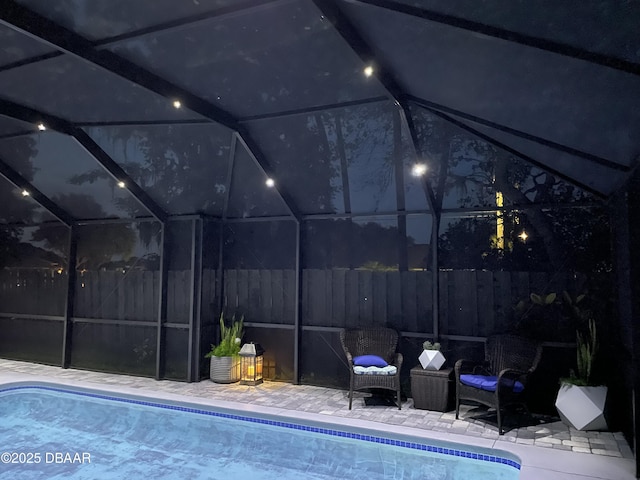 3455 Saddleback Ct, Port Orange, FL 32129 - view of pool featuring glass enclosure and a patio