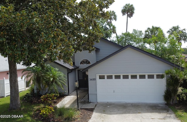 3455 Saddleback Ct, Port Orange, FL 32129 - view of front of home featuring a garage and driveway