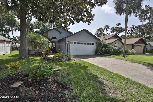 3455 Saddleback Ct, Port Orange, FL 32129 - ranch-style home with a garage, concrete driveway, and a front yard
