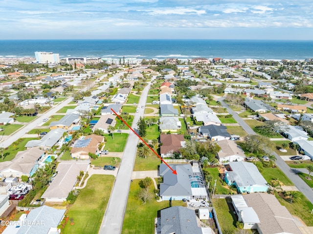 aerial view with a water view and a residential view