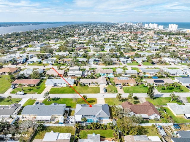 aerial view featuring a water view and a residential view