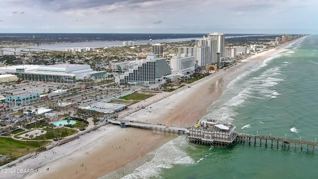 bird's eye view with a beach view and a water view