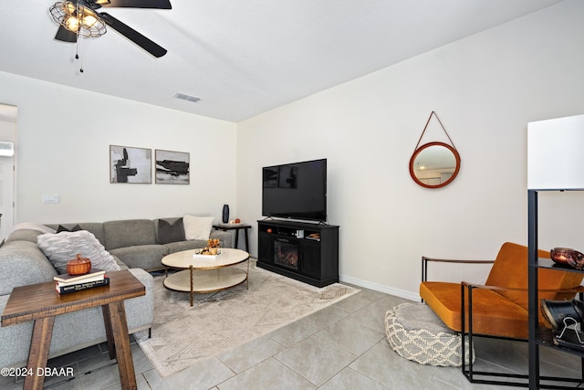1743 Red Rock Rd, New Smyrna Beach, FL 32168 - living area with a ceiling fan and light tile patterned flooring