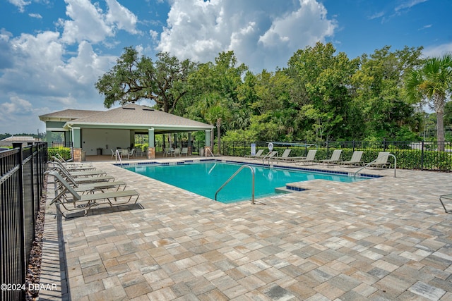 1743 Red Rock Rd, New Smyrna Beach, FL 32168 - community pool with a patio