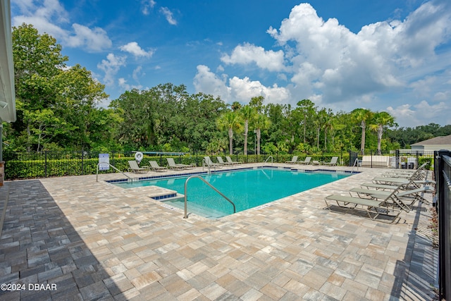 view of pool with a patio area