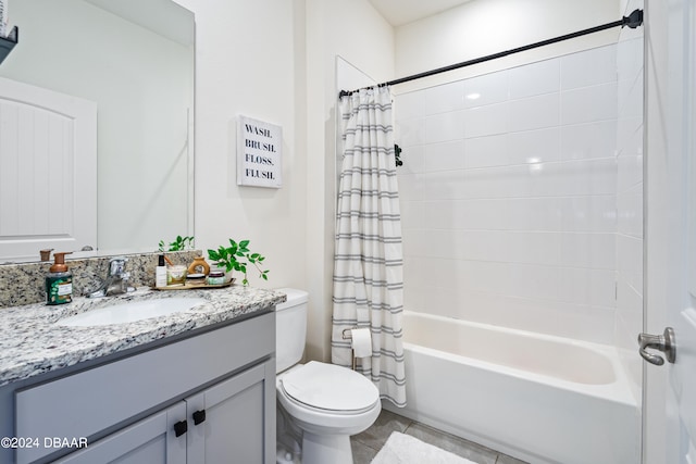 full bathroom with tile patterned flooring, vanity, toilet, and shower / tub combo