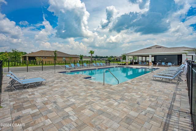 view of pool featuring a patio area