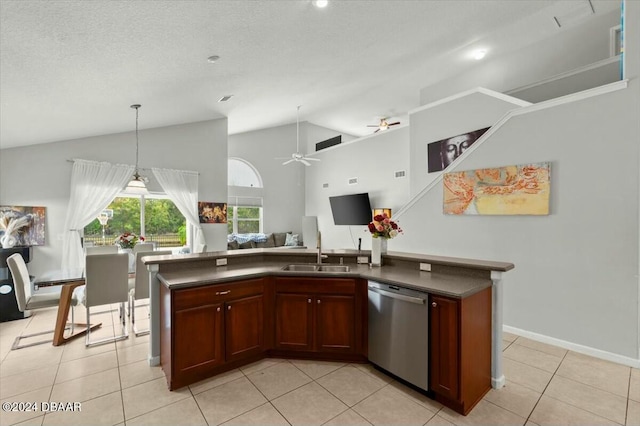 kitchen with dishwasher, sink, a textured ceiling, an island with sink, and light tile patterned flooring