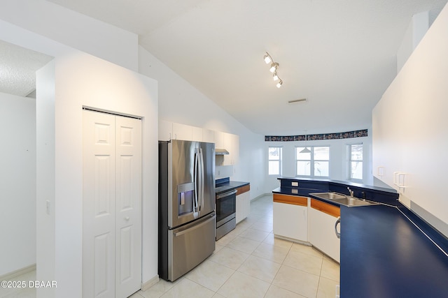 kitchen with white cabinetry, light tile patterned flooring, appliances with stainless steel finishes, and a sink