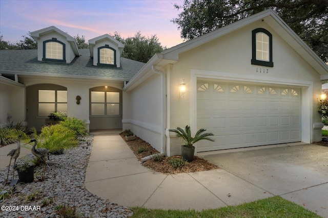 view of front of house with a garage