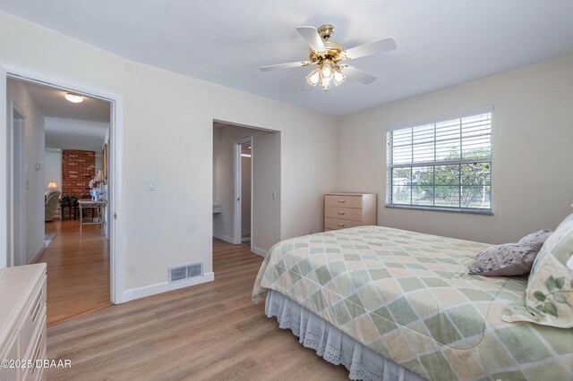 3167 S Peninsula Dr, Daytona Beach, FL 32118 - bedroom featuring a ceiling fan, baseboards, visible vents, and light wood finished floors