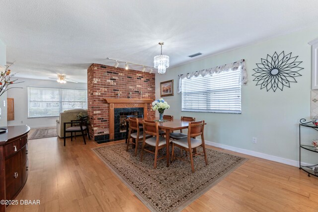 3167 S Peninsula Dr, Daytona Beach, FL 32118 - dining area with a wealth of natural light, visible vents, and light wood-type flooring