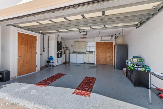 3167 S Peninsula Dr, Daytona Beach, FL 32118 - garage featuring independent washer and dryer, heating unit, a garage door opener, water heater, and freestanding refrigerator