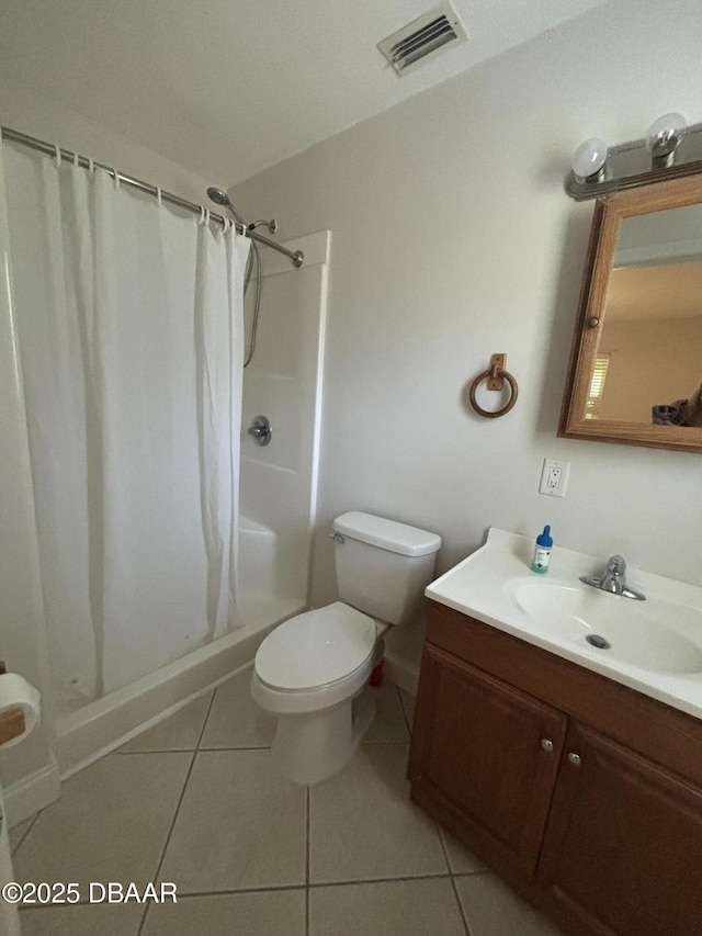 917 Royal Oak Ct, Holly Hill, FL 32117 - bathroom with vanity, a shower with shower curtain, and tile patterned flooring
