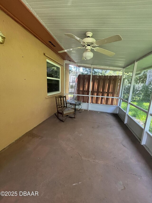 917 Royal Oak Ct, Holly Hill, FL 32117 - unfurnished sunroom with ceiling fan