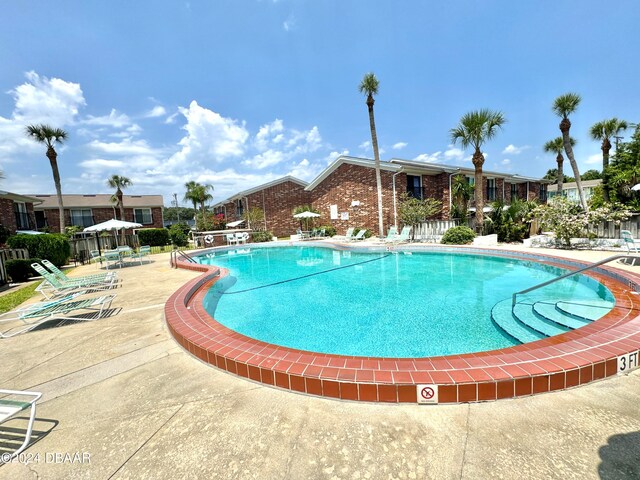 view of pool with a patio