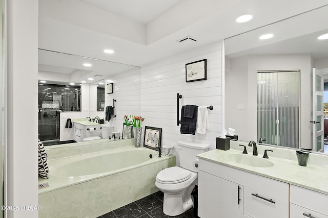 full bathroom featuring independent shower and bath, vanity, and toilet