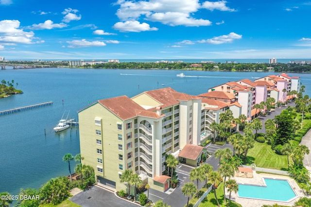 birds eye view of property featuring a water view