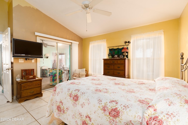 bedroom featuring light tile patterned flooring, lofted ceiling, ceiling fan, and a closet