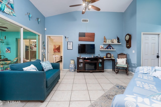 tiled living room featuring high vaulted ceiling and ceiling fan