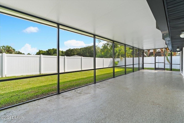 unfurnished sunroom featuring plenty of natural light