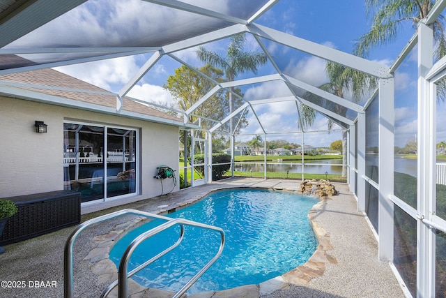 view of swimming pool with a water view, pool water feature, a lanai, and a patio area