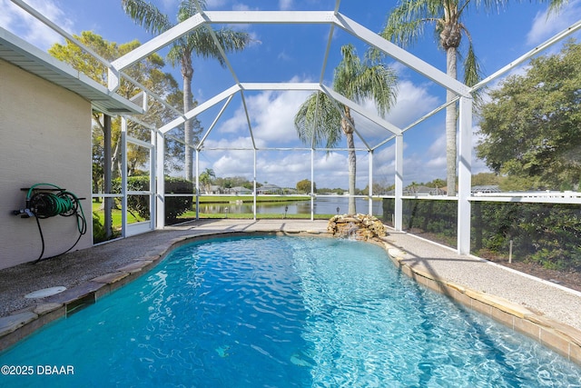 view of pool featuring a water view and a lanai