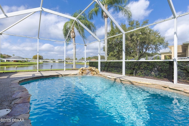 view of pool featuring a water view, pool water feature, and a lanai